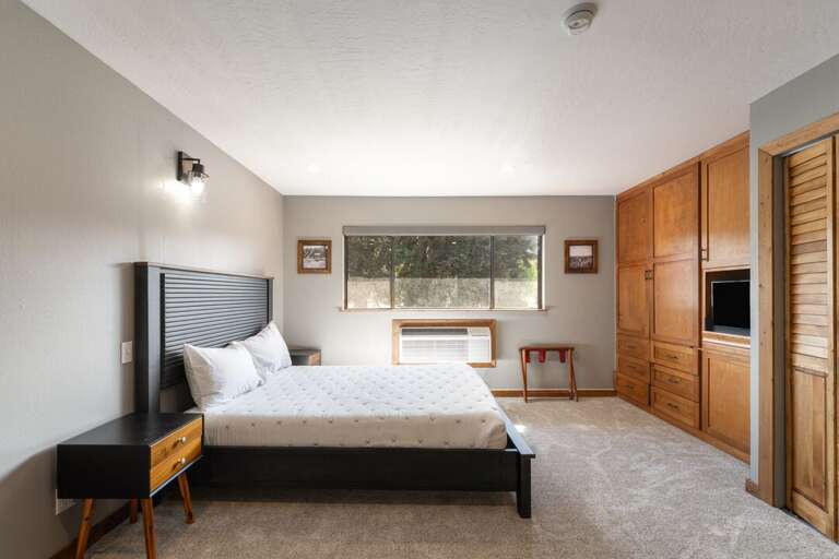 Queen bed for your comfort. | Main Level