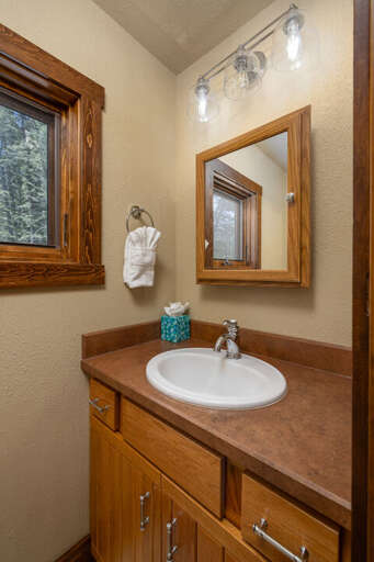 Convenient half bathroom in loft area | Upper Level