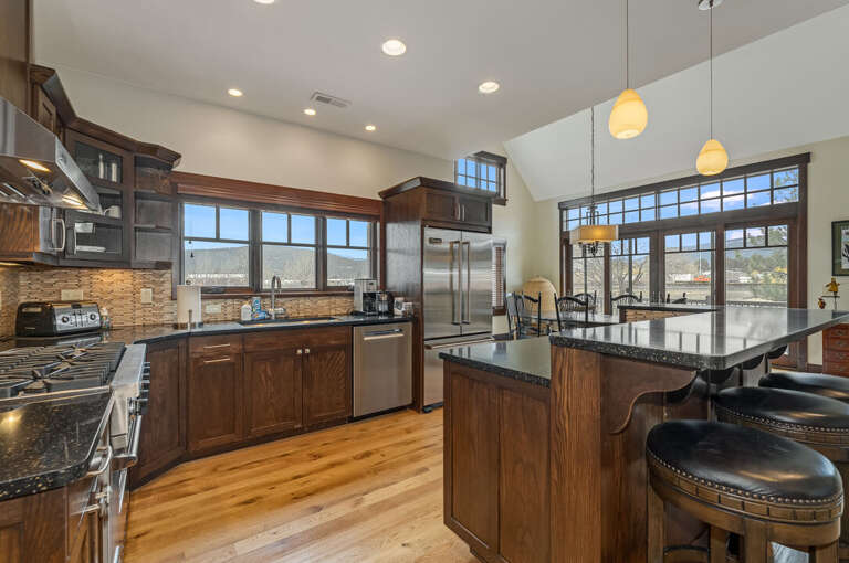 Large kitchen that is open and bright. | Main Level