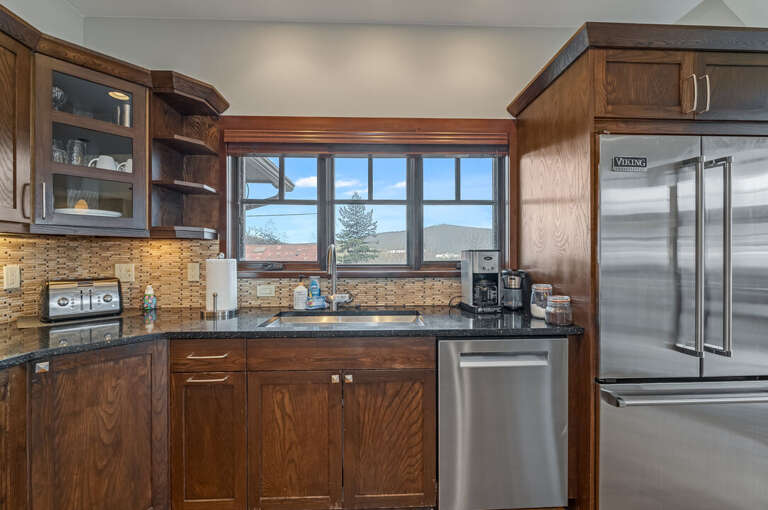 Large kitchen sink with windows. | Main Level
