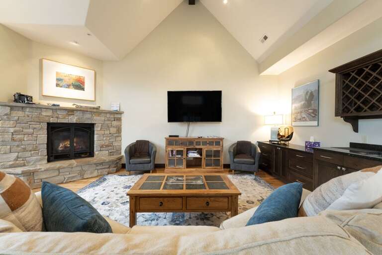 Living room with TV. | Main Level