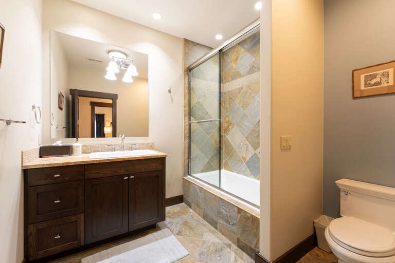 Shower/tub combo and single vanity. | Main Level
