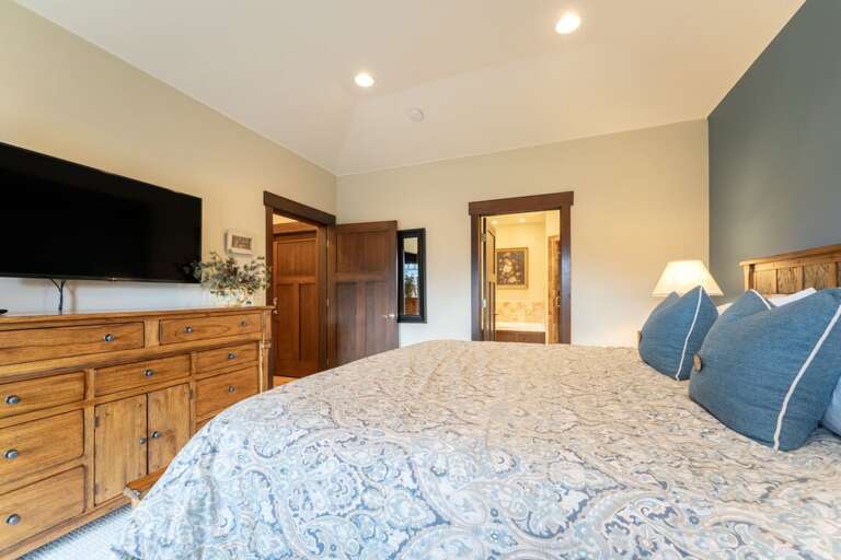 TV and ensuite in the primary. | Main Level