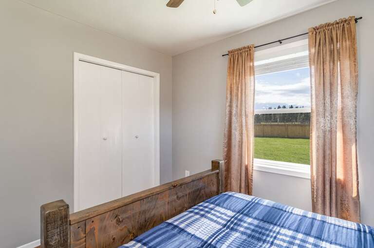 Full bed and closet. | Glacier Ridge House