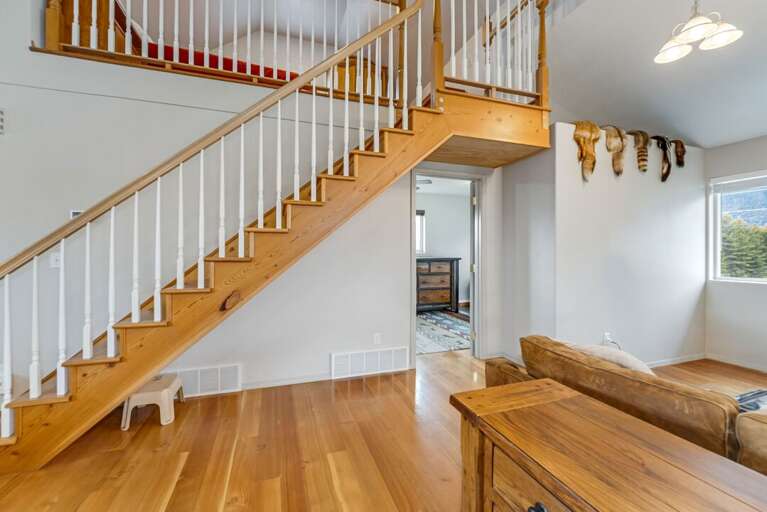 Living and stairs to loft. | Glacier Ridge Suite