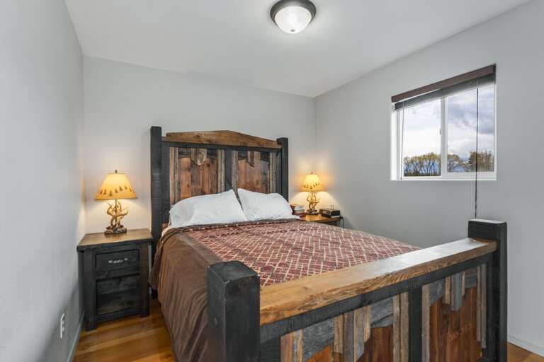 Primary bedroom with queen bed.
