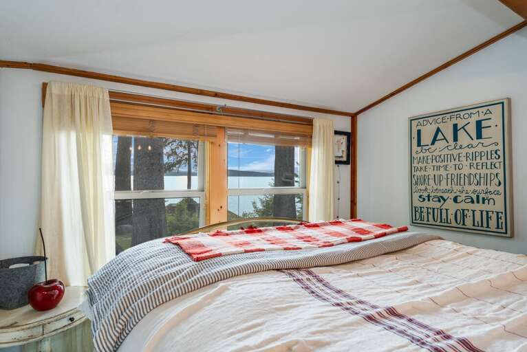 Second bedroom with lake views. | Main Level