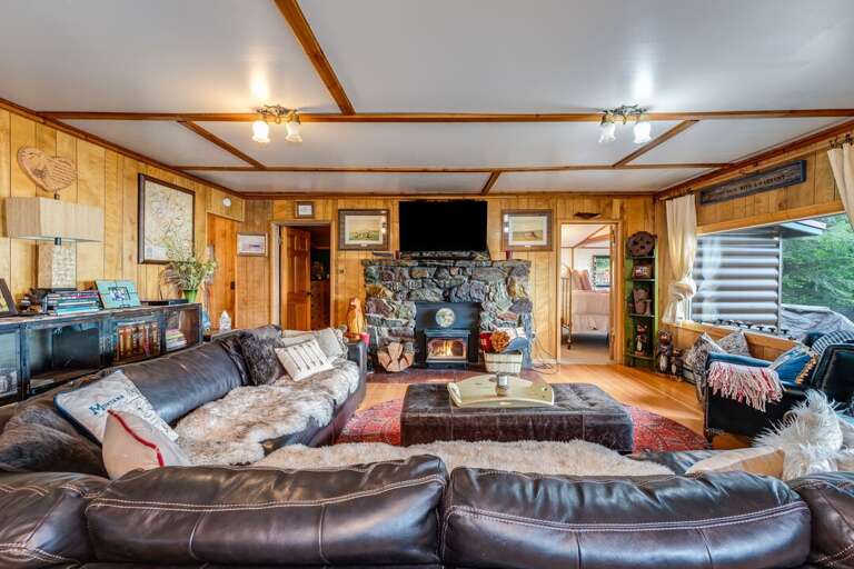 Living room to relax in after a day on the water. | Main Level