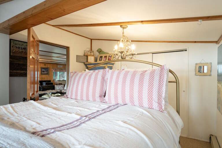Queen size bed. | Main Level