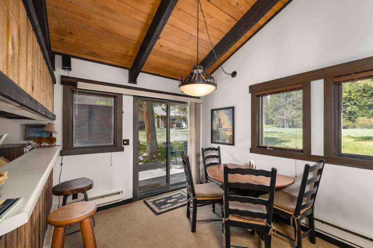 Dining table for four, bar seating for two | Main Level