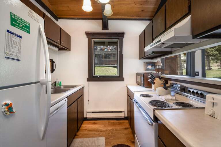Fully equipped kitchen with mountain charm | Main Level