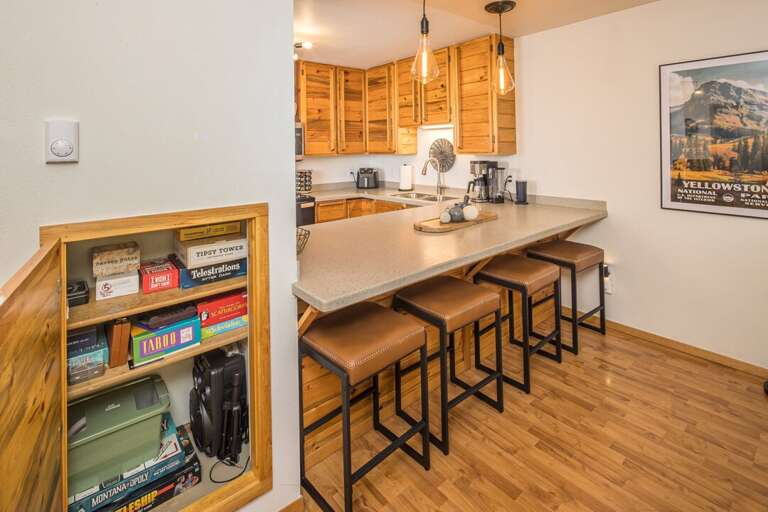 Bar seating for four to enjoy a quick snack | Main Level