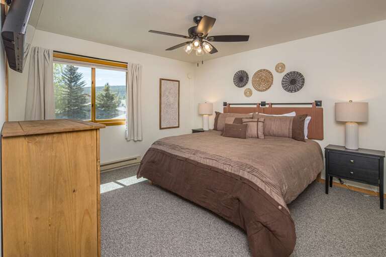 Curl up in the King bed to rejuvenate for the next day of adventures | Upper Level