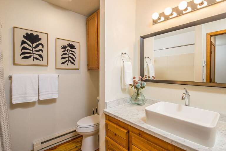 Single Vanity in the shared bathroom | Upper Level