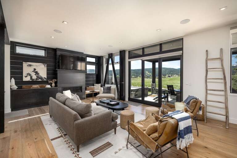 Leather chairs, coffee table and inspired rug
Main Level