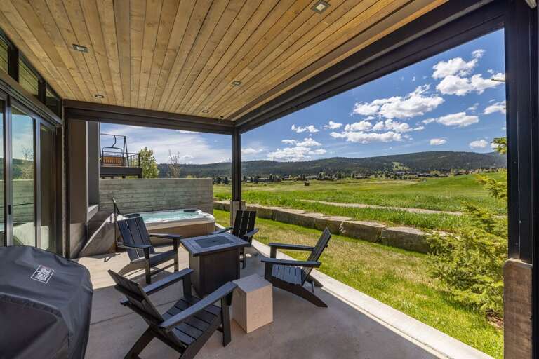 Outdoor seating with hot tub | Exterior View