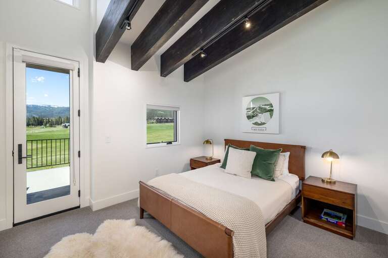 Queen Bed with a touch of comfy bedding I Upper Level
