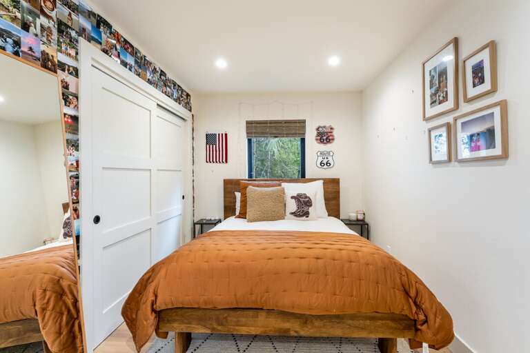 bedroom with queen size bed on main floor | Interior