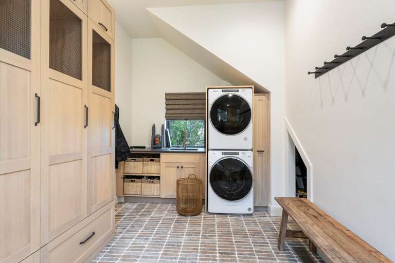 Storage area with washer and dryer | Interior