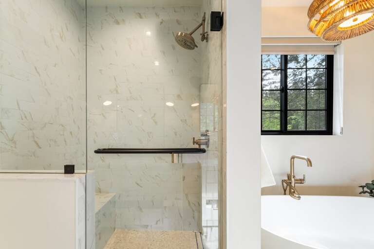 Walk-in shower in primary bathroom | Interior