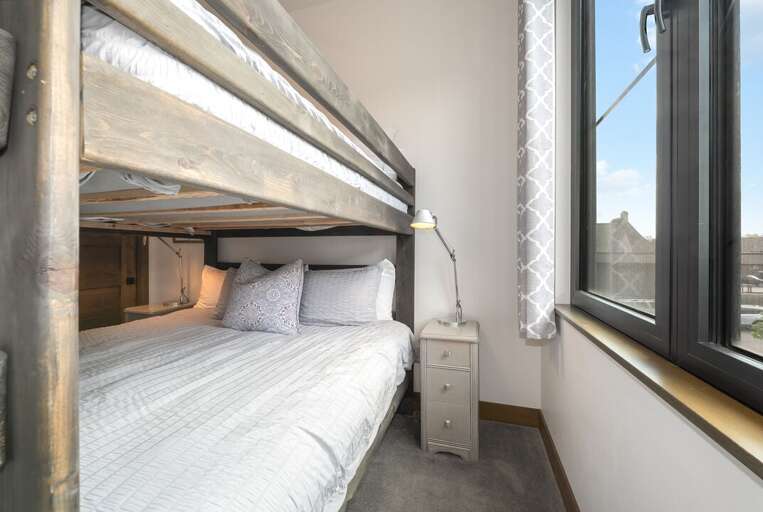 Second bedroom with queen over queen bunk beds | Interior