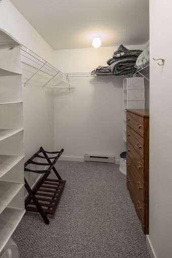 Large walk-in closet in primary bedroom | Main Level