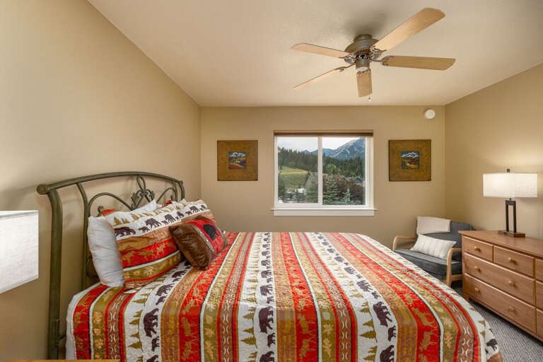 Queen bed in secondary bedroom | Main Level
