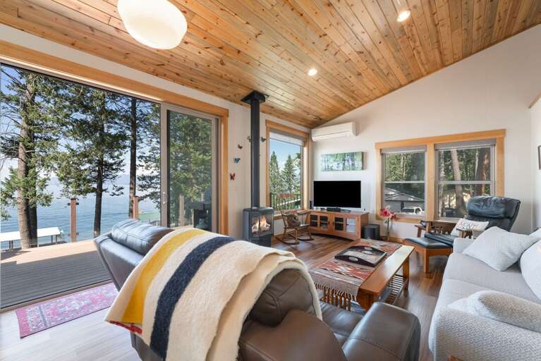 Lake views by the cozy fire. | Upper Level
