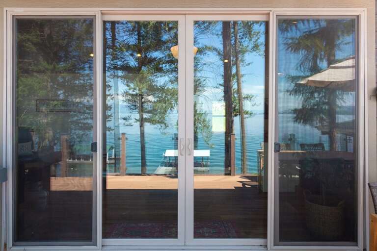 Even the reflection of the lake from the sliders is breathtaking I Upper Level