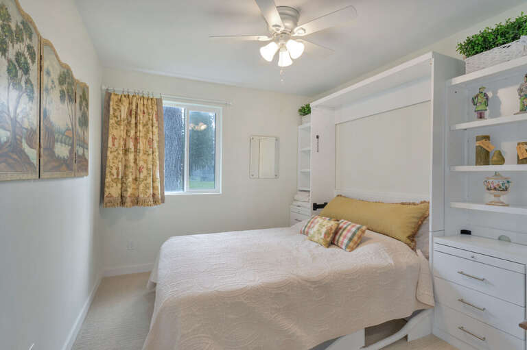 Ceiling fan and storage. | Main Level