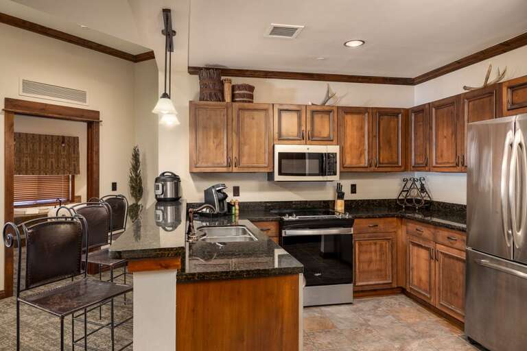 Fully equipped kitchen for home cooked meals | Main Level