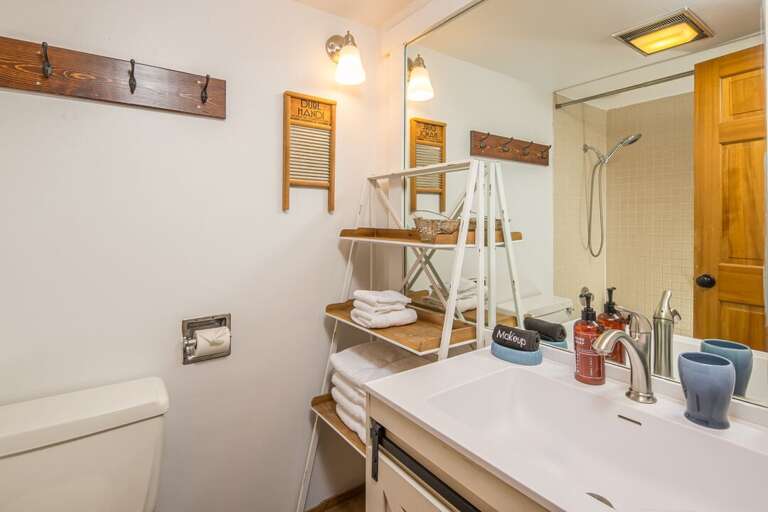 Tiled shower with shelf | Main Level
