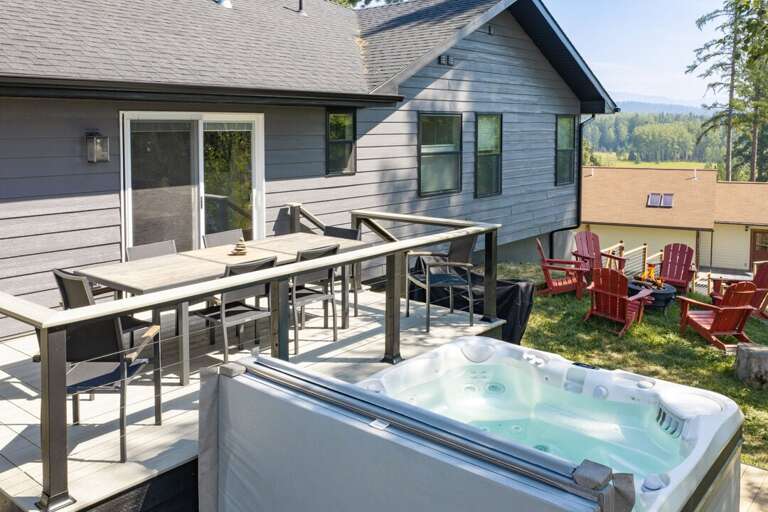 The hot tub sits ready just steps off the deck I Exterior
