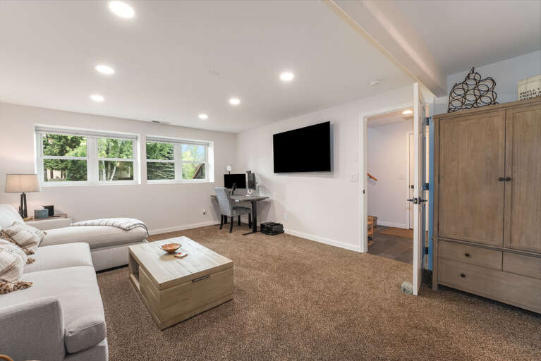Movie night or work from home this downstairs living room has it I Lower Level