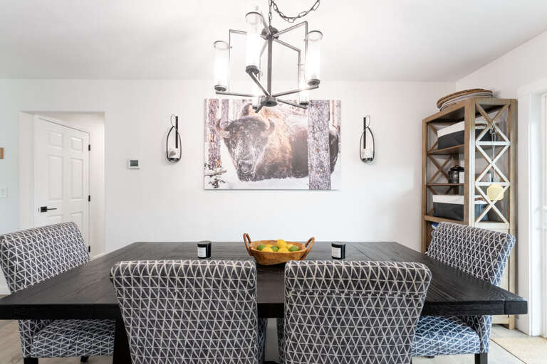 Rustic art and a cozy dining nook full of character I Upper Level