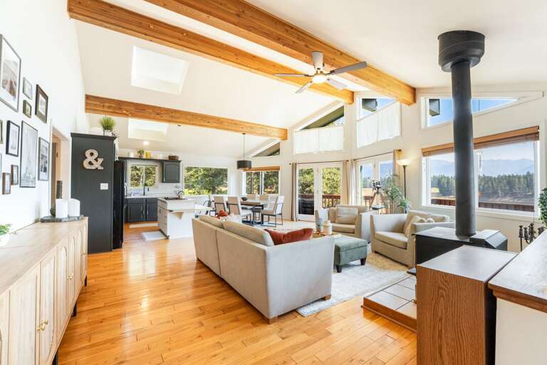 Open floor entertainment room and kitchen. | Main Level