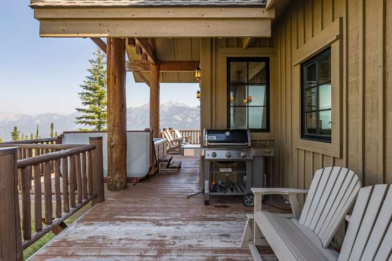 Covered deck with gas grill, hot tub and mountain views | Exterior