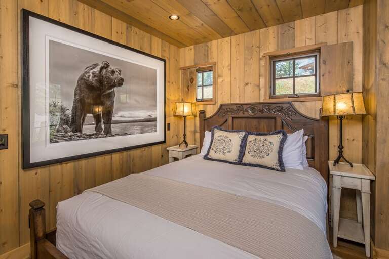 Rustic bedroom with grizzly bear art | Main Level