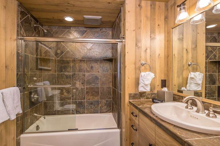 Tiled shower and tub combo | Main Level