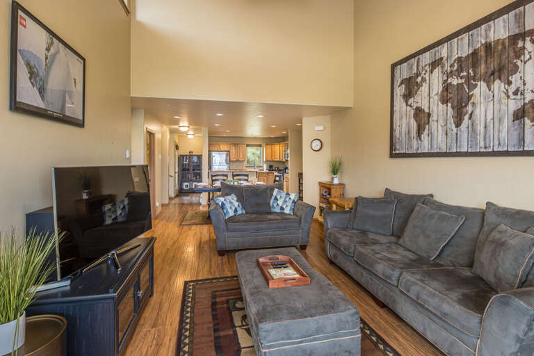 Cozy living room with stone fireplace | Main Level