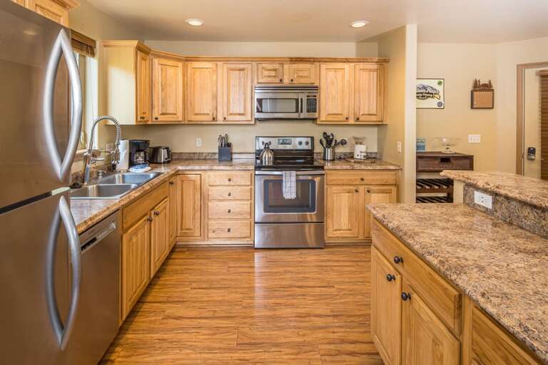Modern appliances with wooden accents | Main Level