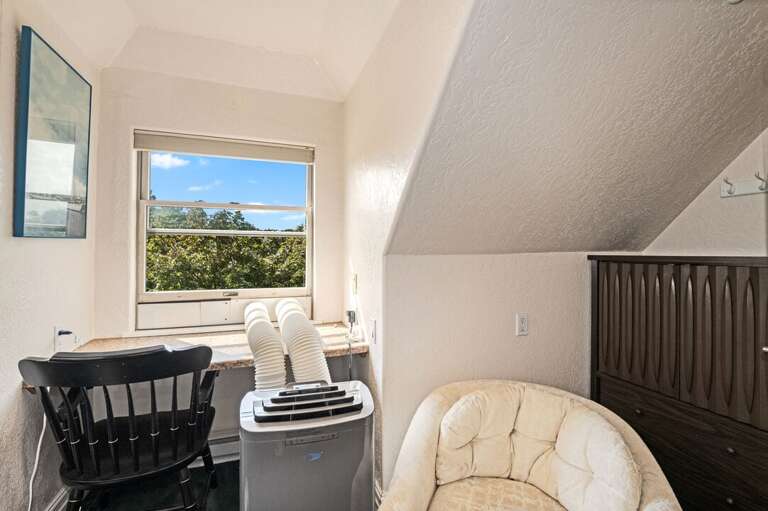 AC and desk area. | Third Level