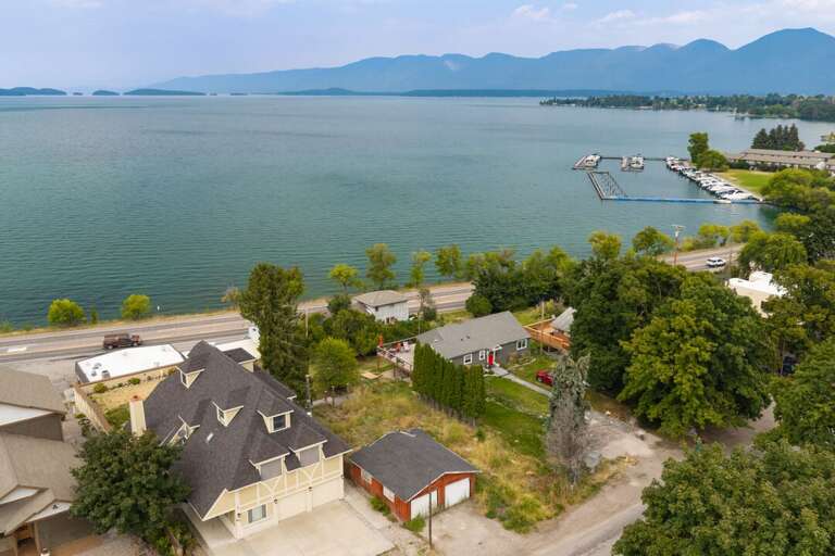 Ariel views of the home and the lake.