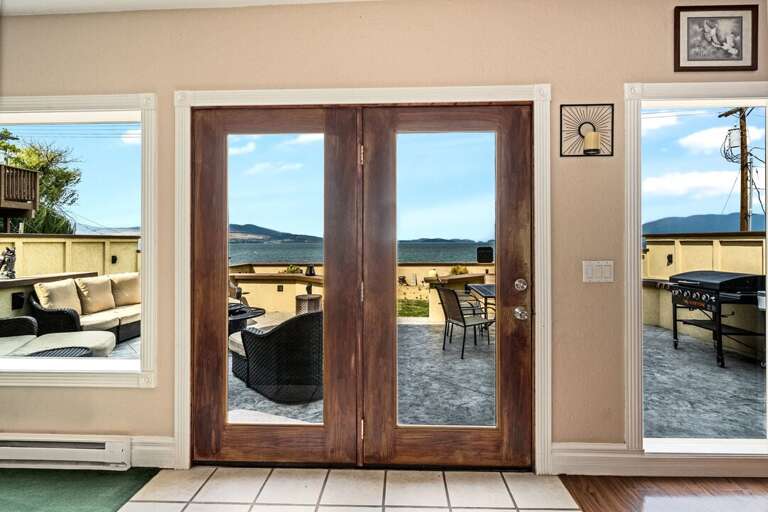 Doors to the back deck and yard. | First Level