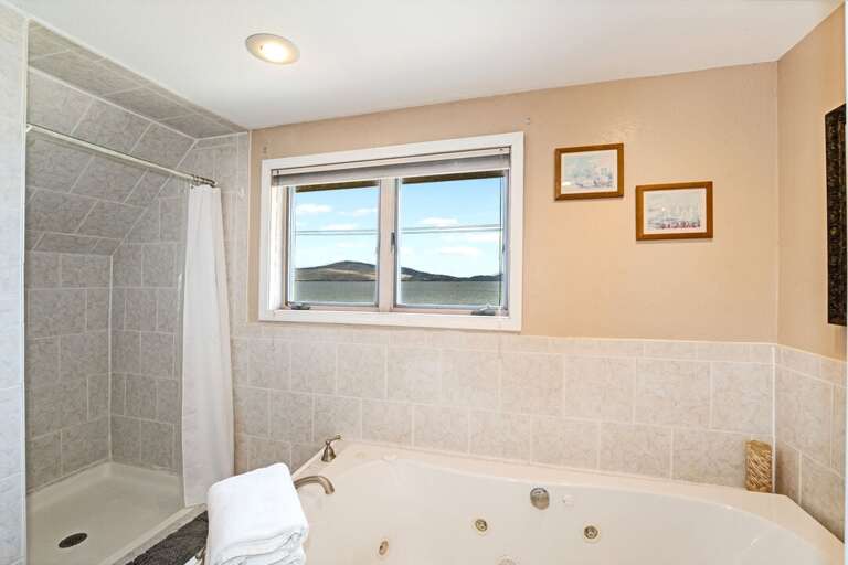 A full soaking tub too! | Second Level