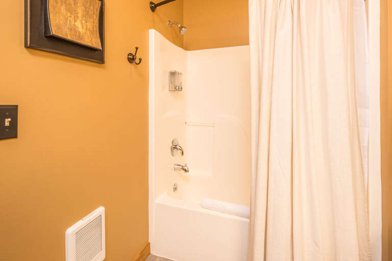 Tub/shower combo in 3rd bathroom | Lower Level