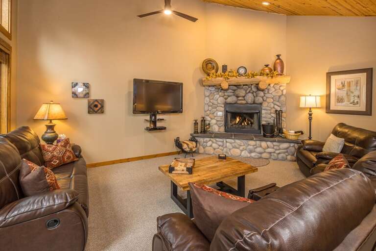 Wind down in front of the fireplace and share stories from your day | Main Level
