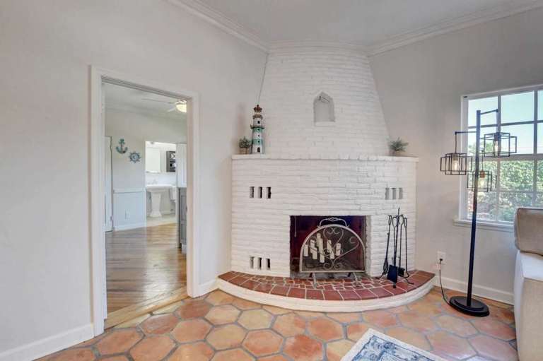 Interior With White Fireplace And Hexagonal Tiles Interior With White Fireplace And Hexagonal Tiles