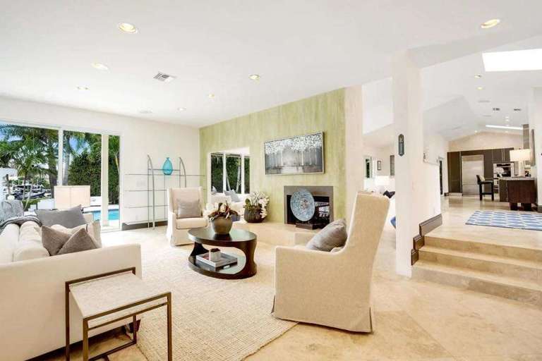 Interior Living Space With Furniture And Pool View Interior Living Space With Furniture And Pool View