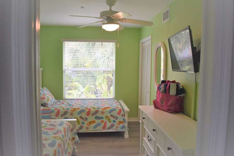 Bedroom2: 'Flip Flop' room with 2 twin beds, and a Smart TV w/Roku